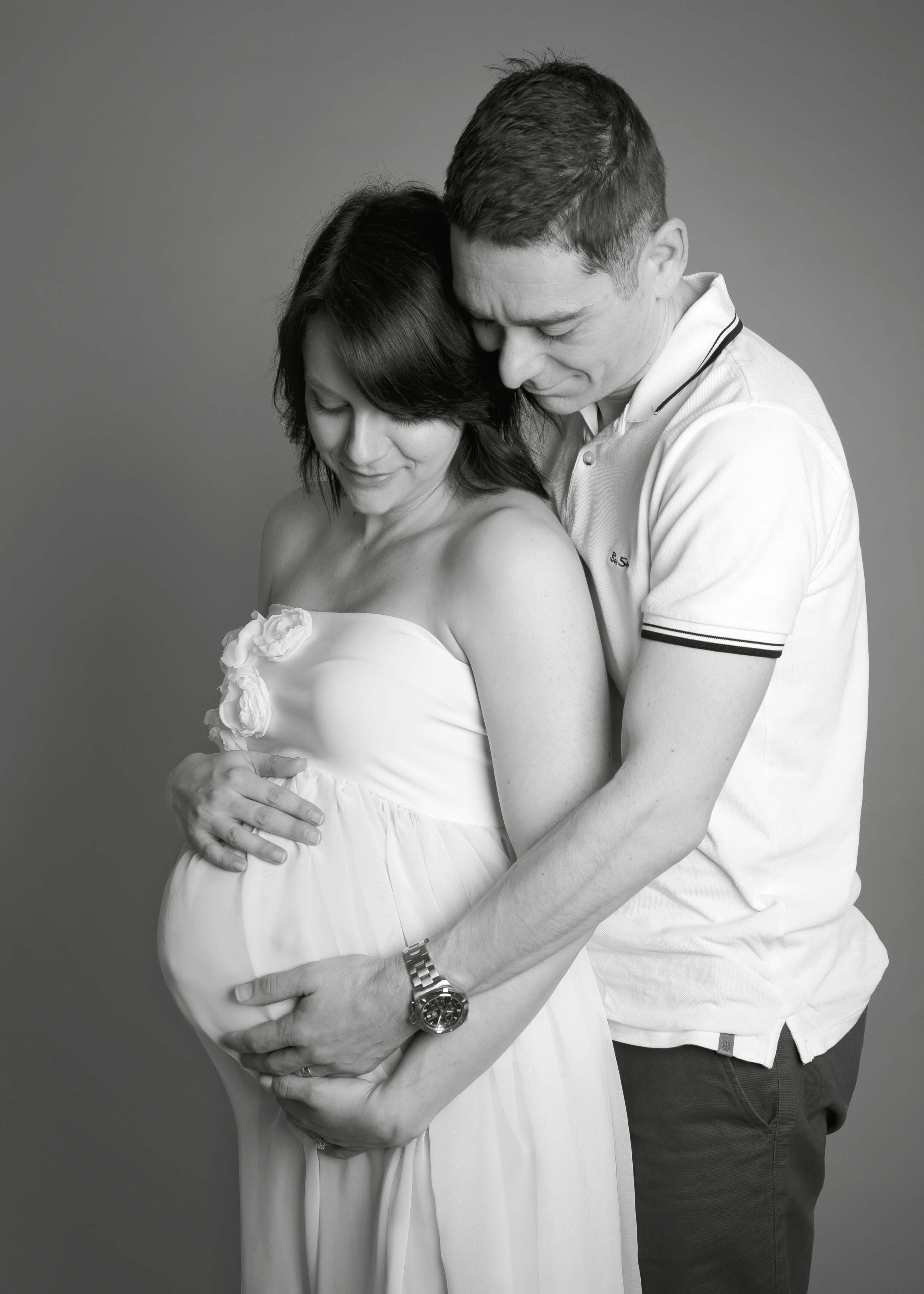 couple's studio maternity shoot in Winchester, Hampshire