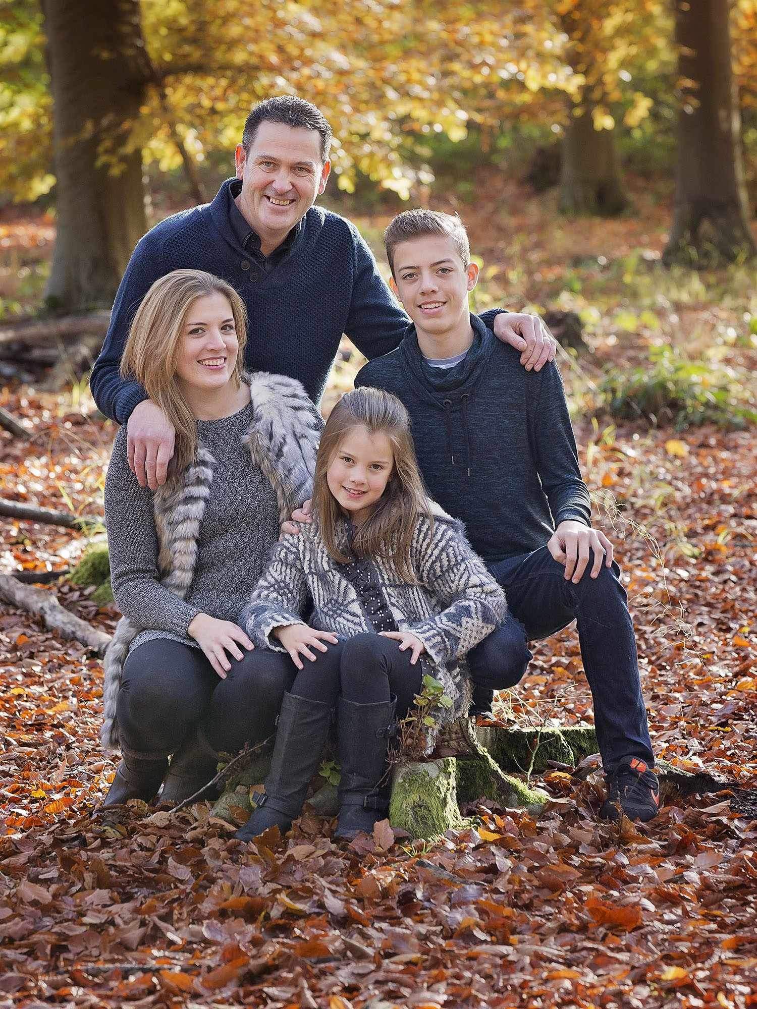 Family outdoors woods by family photographer Winchester