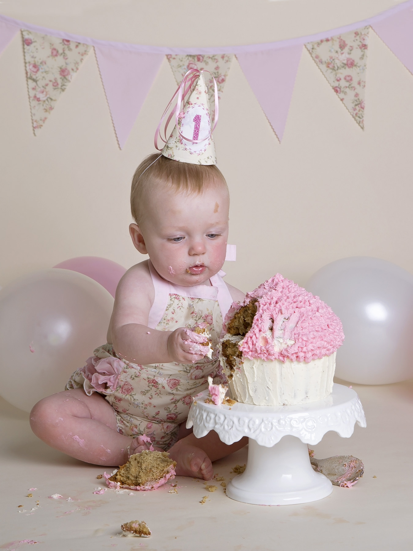 girl in tutu and hat eating cake by cake smash photographer Winchester