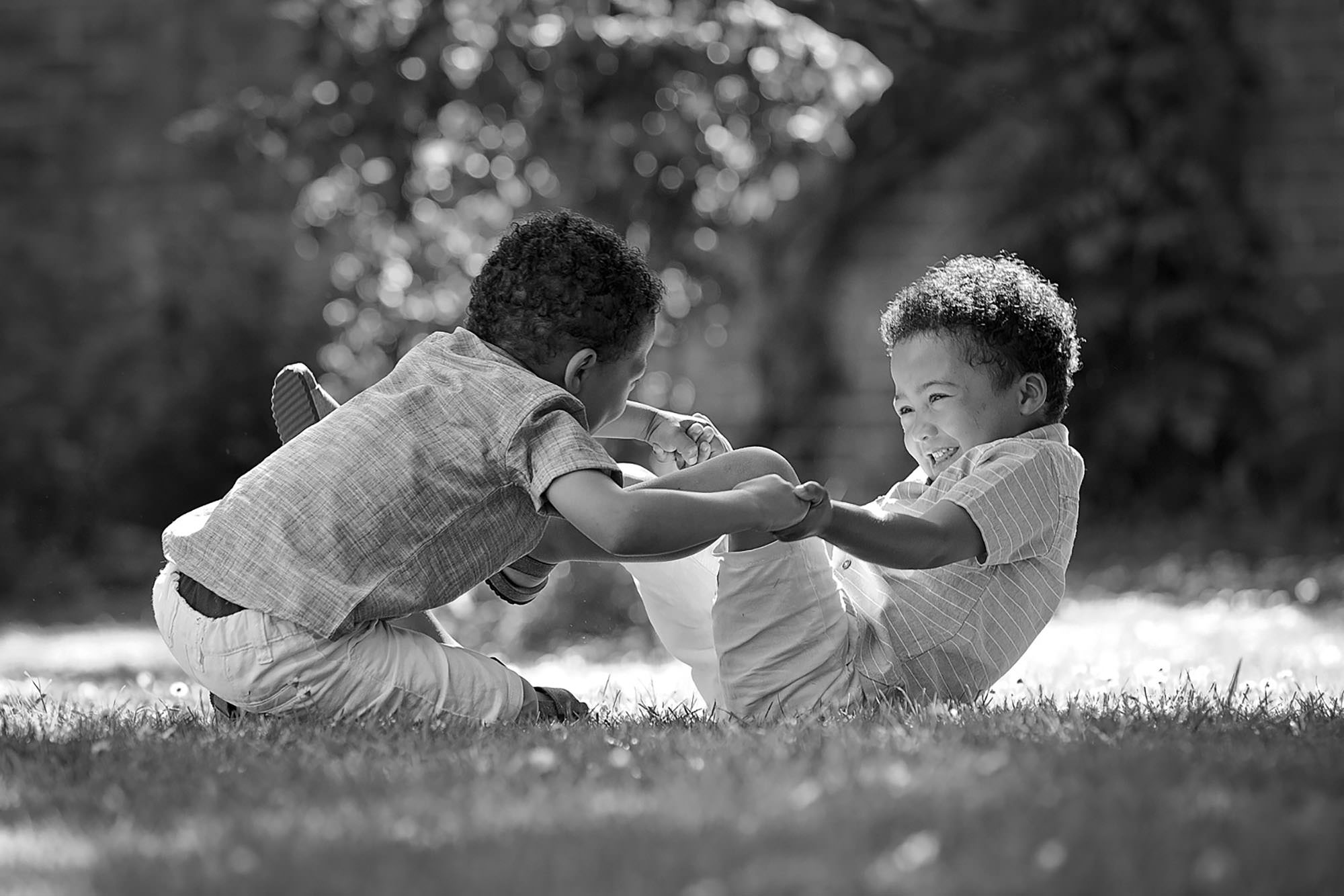 Brothers playing by family photographer Winchester