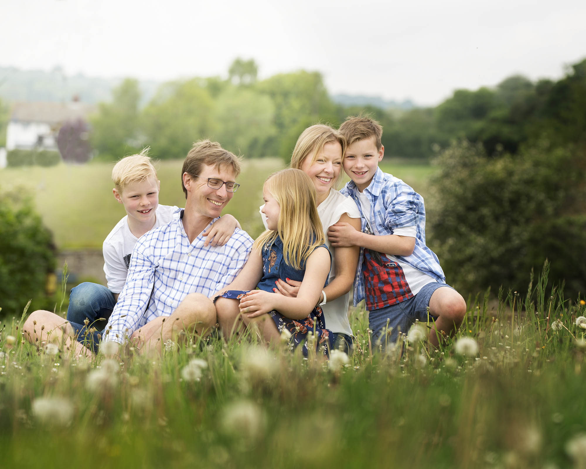 Siblings and parents by family photographer Hampshire 