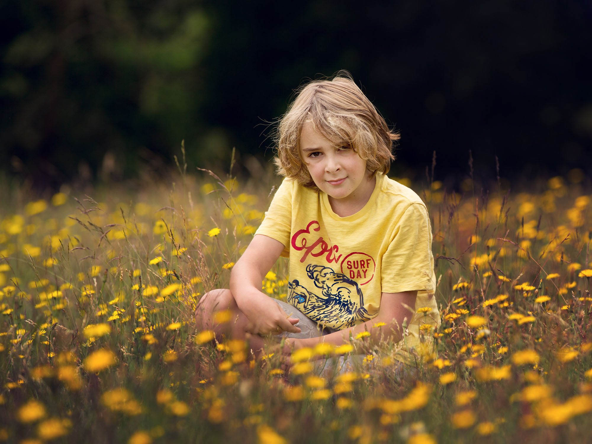 Boy in flowers by family photography Winchester 