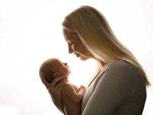 silhouette of mother and baby in studio in Hampshire