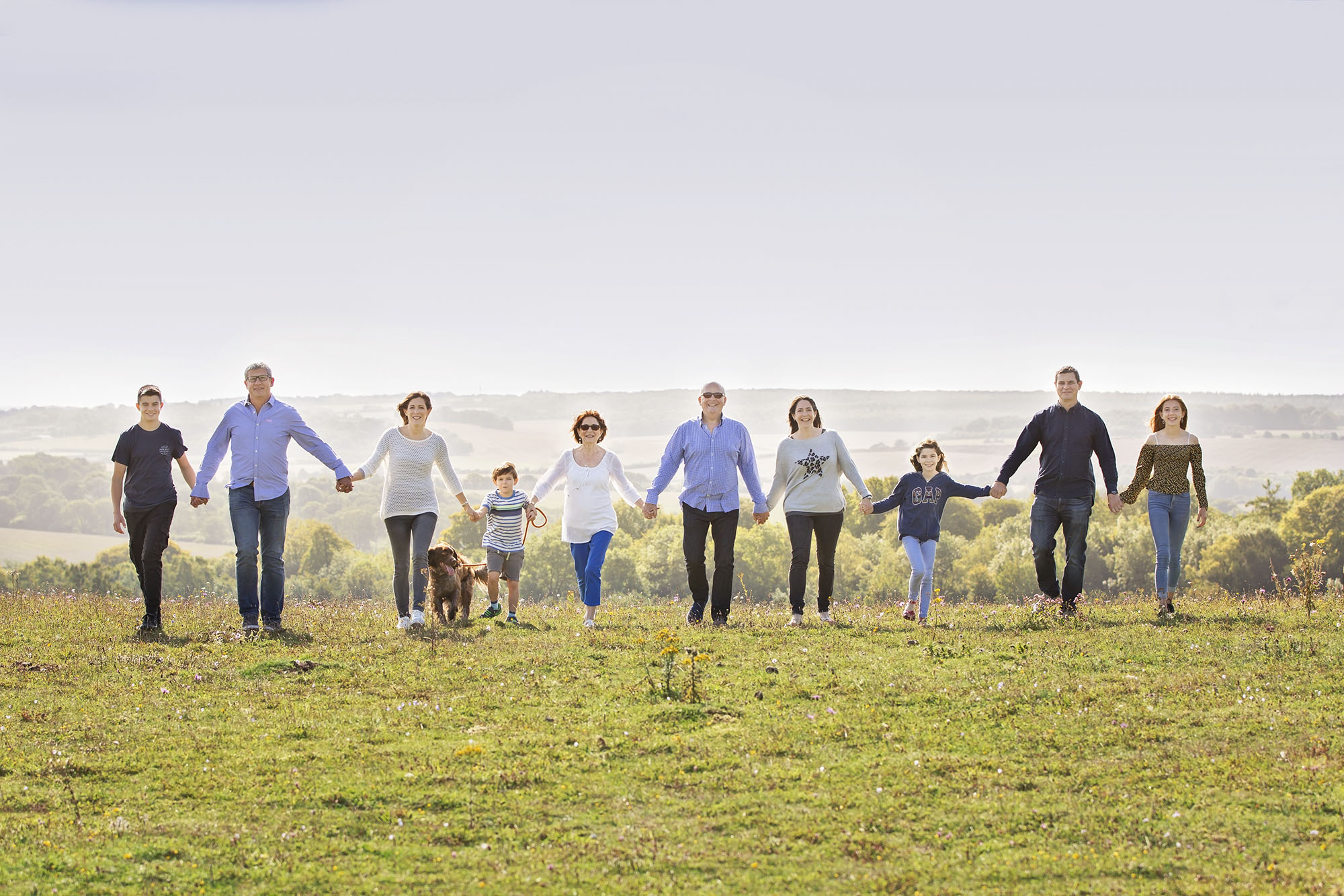 huge family outdoor together by family photographer Winchester 