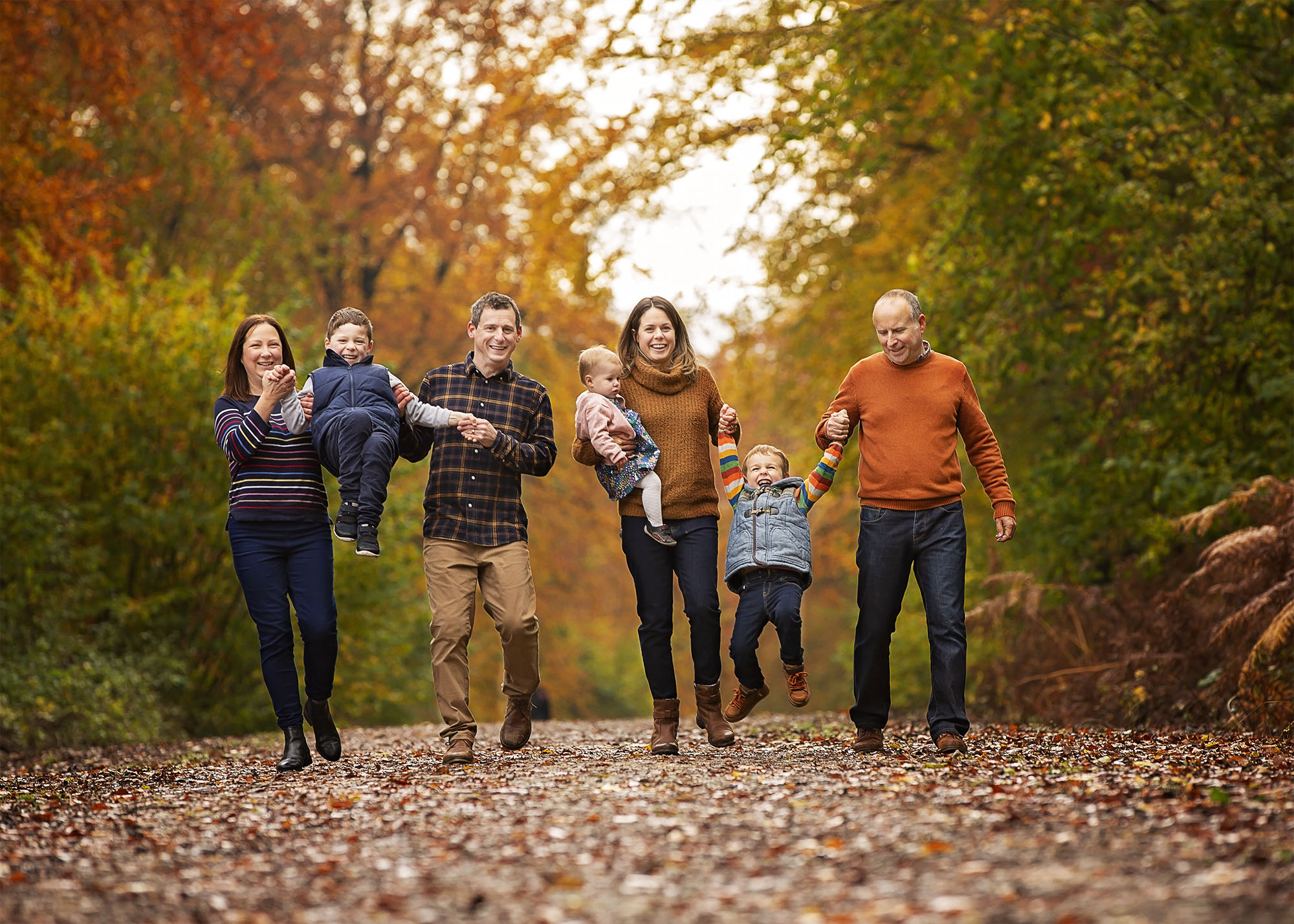 Parents and children in woods by family photographer Winchester 